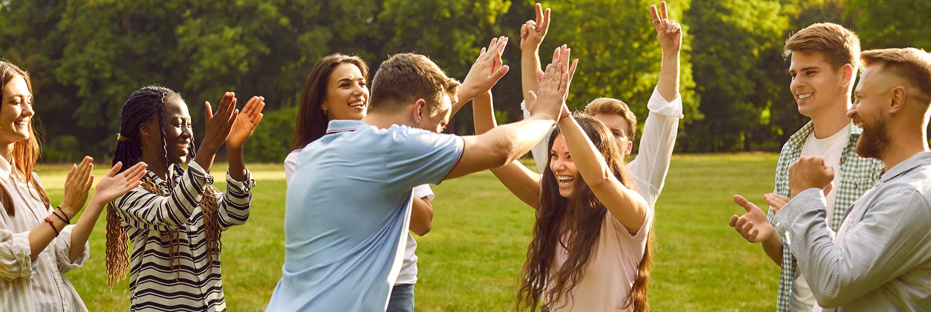 Group of people outside celebrating